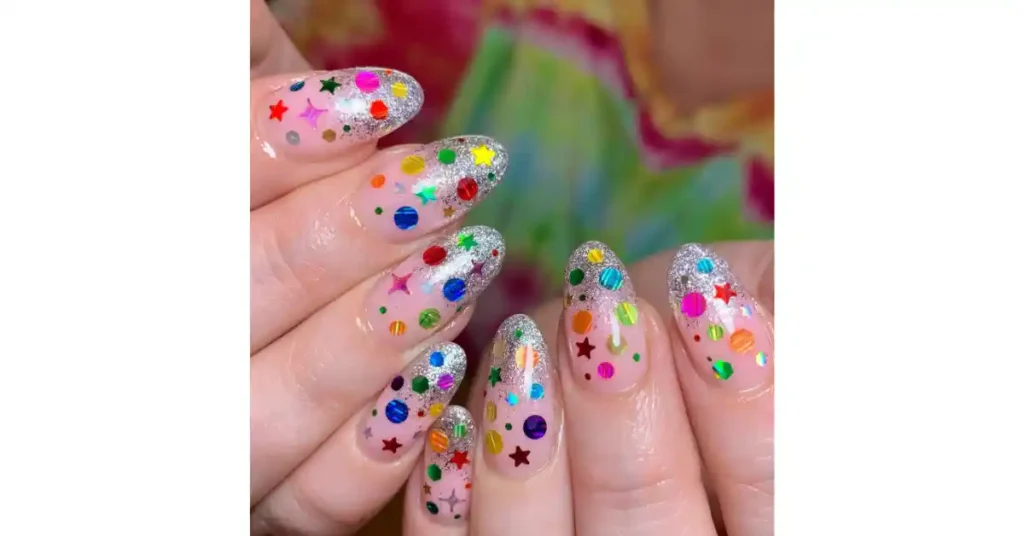 4. Clear acrylic nails with cute confetti