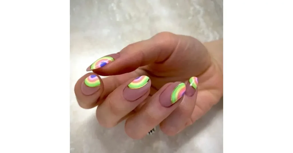 40. Pastel chrome acrylic nails with rainbow nail art