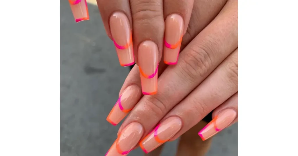 13. Pink and orange ombre French tip nails