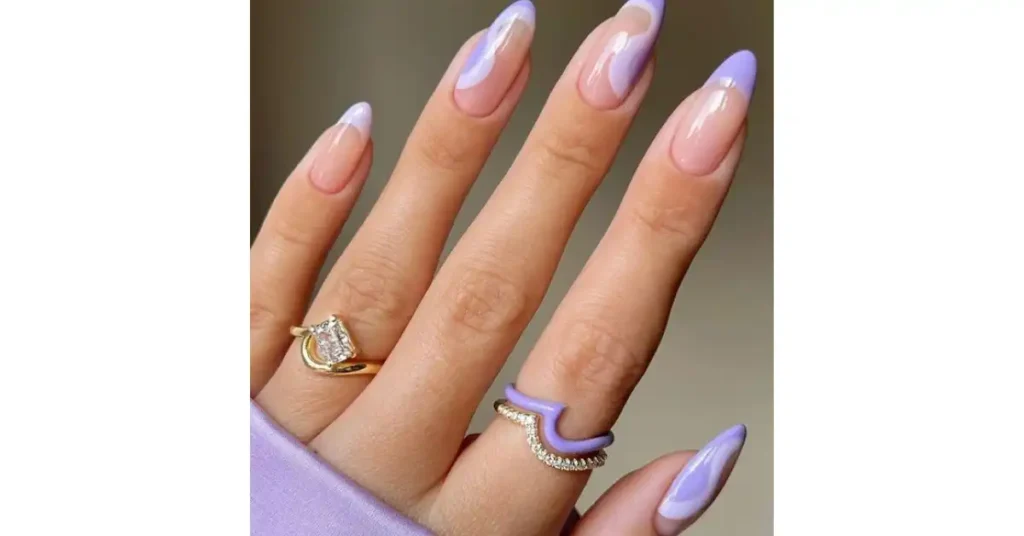 14. Lilac acrylic squiggle nails with French tips