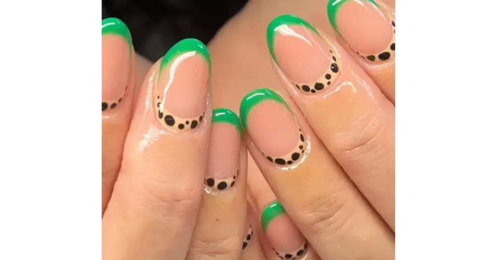 16. Green French tip acrylic nails with animal print cuffs