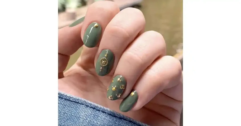 17. Olive green 3D acrylic nails with chrome finish