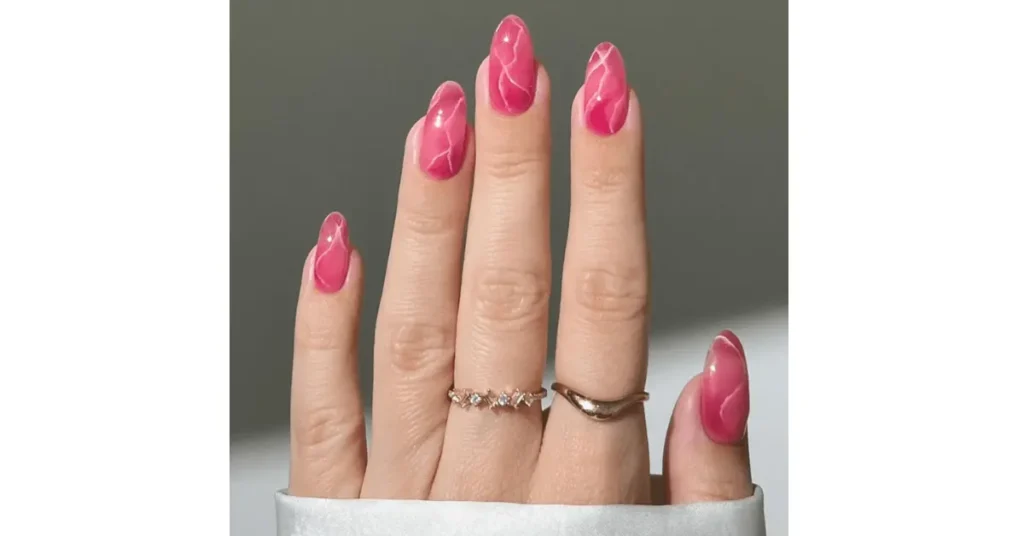 52. Baby pink wavy chrome acrylic nails