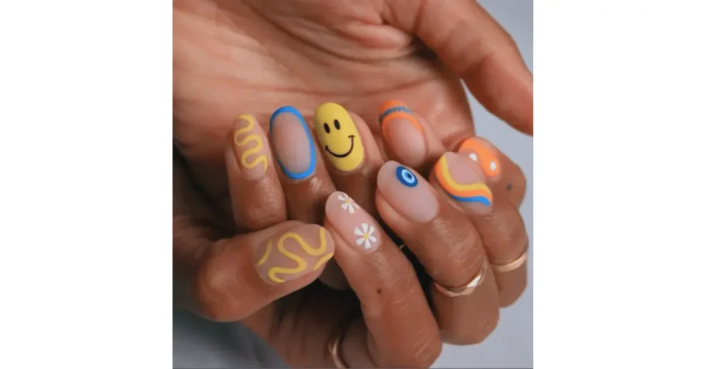 54. Mismatched designs acrylic nails